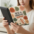 E-reader case with "Rest Is Productive" and motivational phrases.