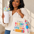 Teacher Gift Set: Big Heart Tote Bag and Tumbler with Pen and Keychain - held in hand