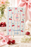 Personalized calendar with cherry design and 'Samantha 2026' text on a decorative background.