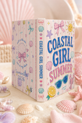 Open coastal summer journal showing lined pages for travel and beach notes