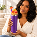 Purple Tumbler Gift Set with Orange Removable Topper, Pen, Keychain - held in hand