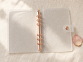 A5 glitter binder open showing rose gold 6-ring mechanism