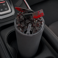 Bloody knife magnetic tumbler lid in car cupholder with black resin ice and clear red-stained blades
