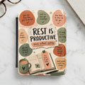 Journal cover with "Rest is Productive" and self-care messages.