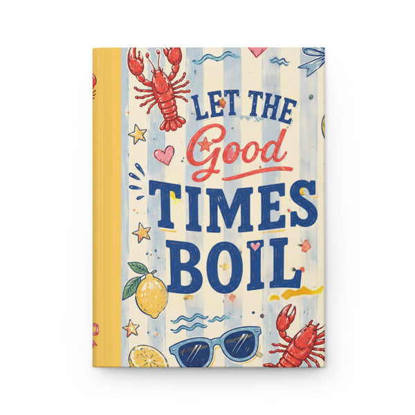 Notebook with a colorful cover featuring text 'Let the Good Times Boil' and illustrations of lobsters, lemons, and sunglasses.
