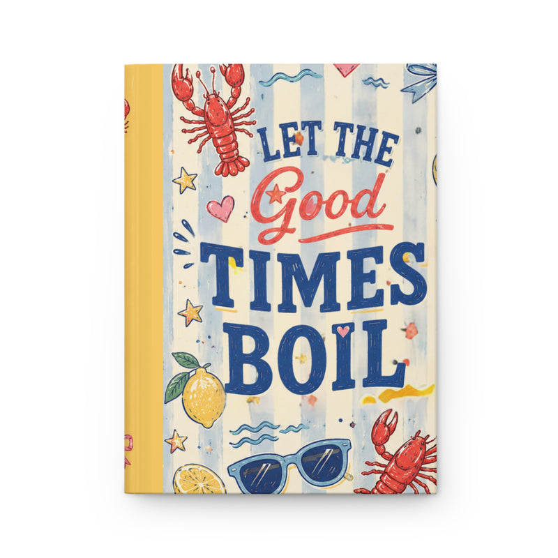 Notebook with a colorful cover featuring text 'Let the Good Times Boil' and illustrations of lobsters, lemons, and sunglasses.